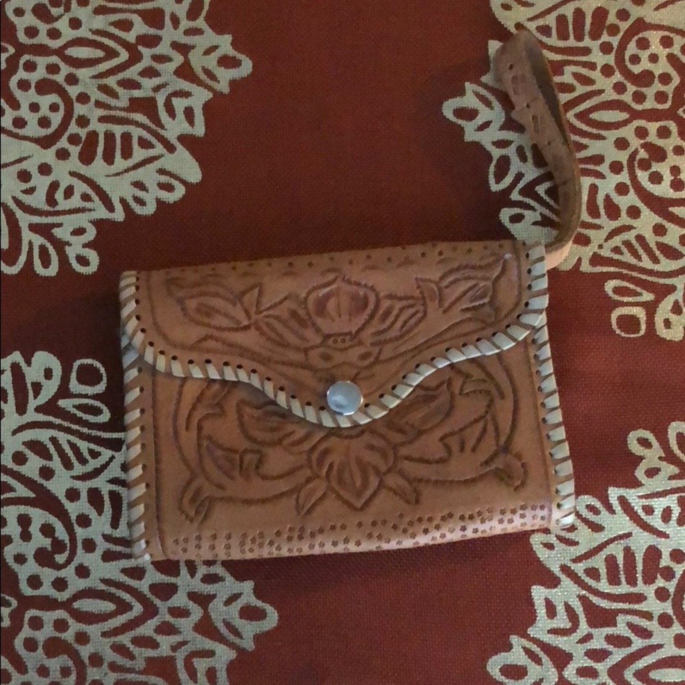 Vintage embossed leather clutch